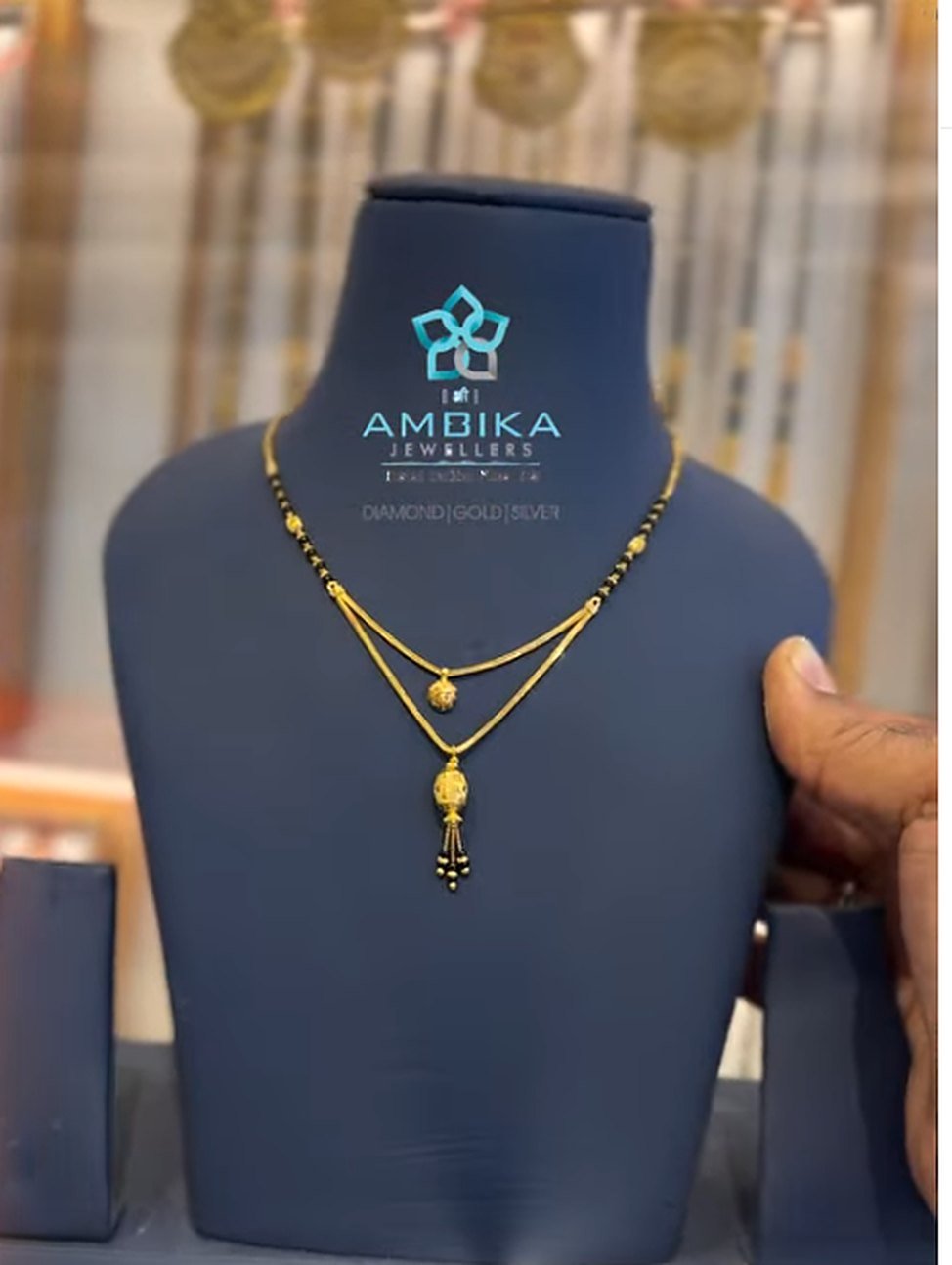 Two-layer gold and black bead mangalsutra